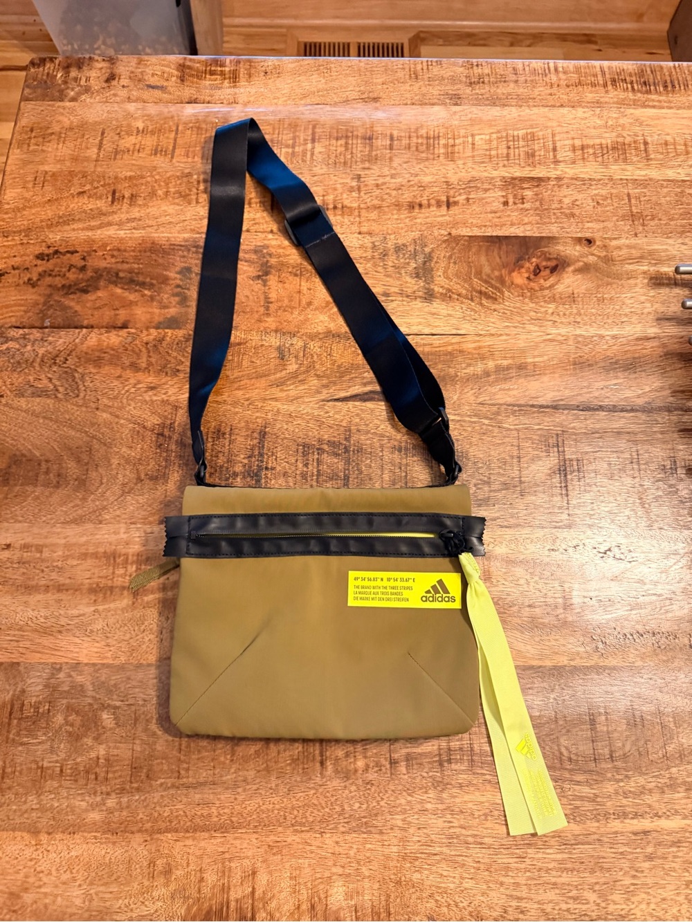 adidas Olive Green Crossbody Shoulder Bag with neon yellow tag and ribbon - blac